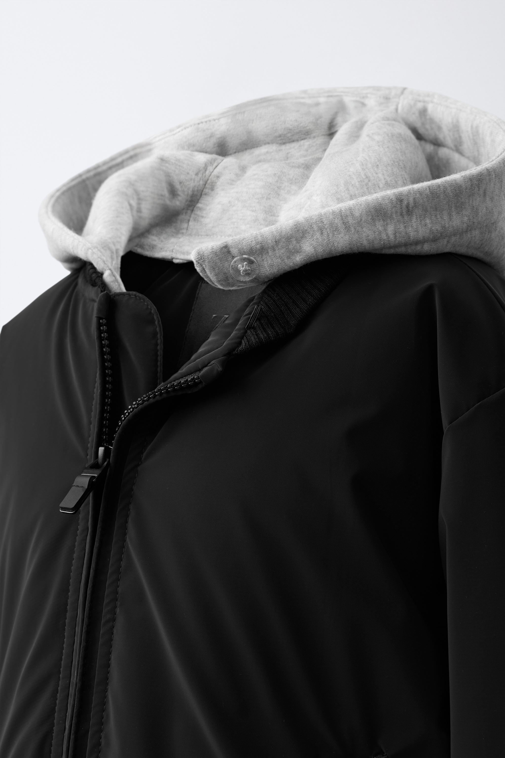 RUBBERIZED BOMBER JACKET WITH REMOVABLE FLEECE HOODIE